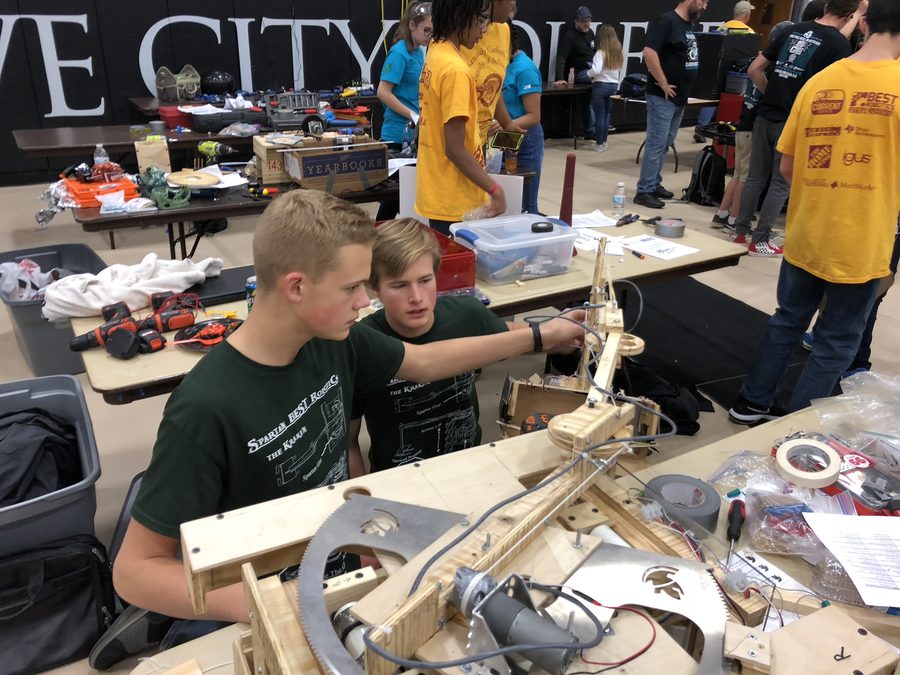 Students working on robotics at STEAM competition